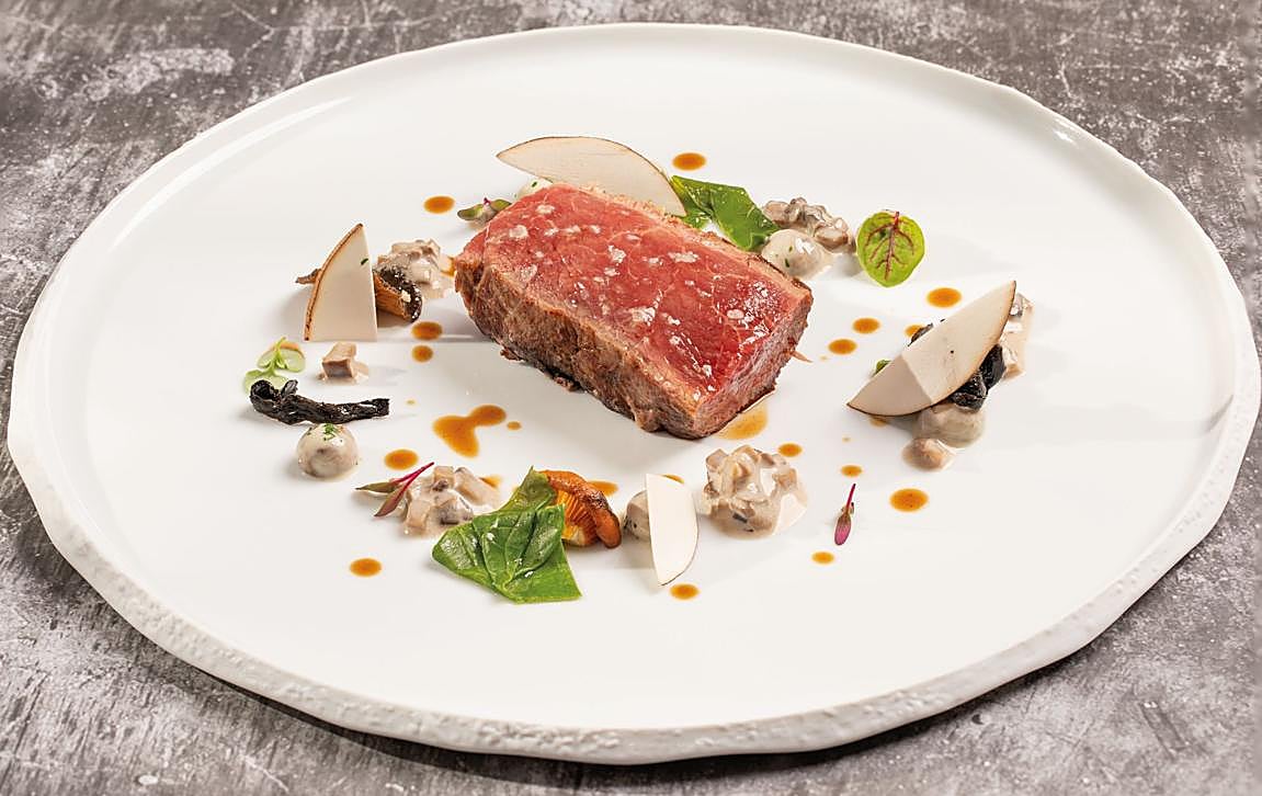 Blanqueta de cerdo y 'champis' cremosos