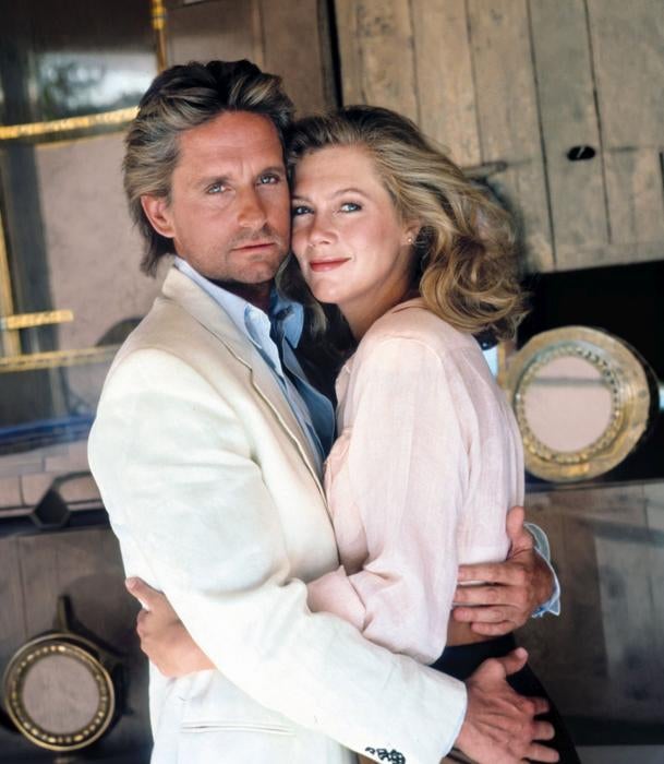 Tras 40 años negándolo, admite que tuvo un romance con Kathleen Turner en el rodaje de 'Tras el corazón verde'. Nadie se enteró porque se veían en la habitación de ella cuando el resto del equipo dormía. Ella sabía que él estaba casado; sólo lo dejó cuando su esposa visitó el rodaje.