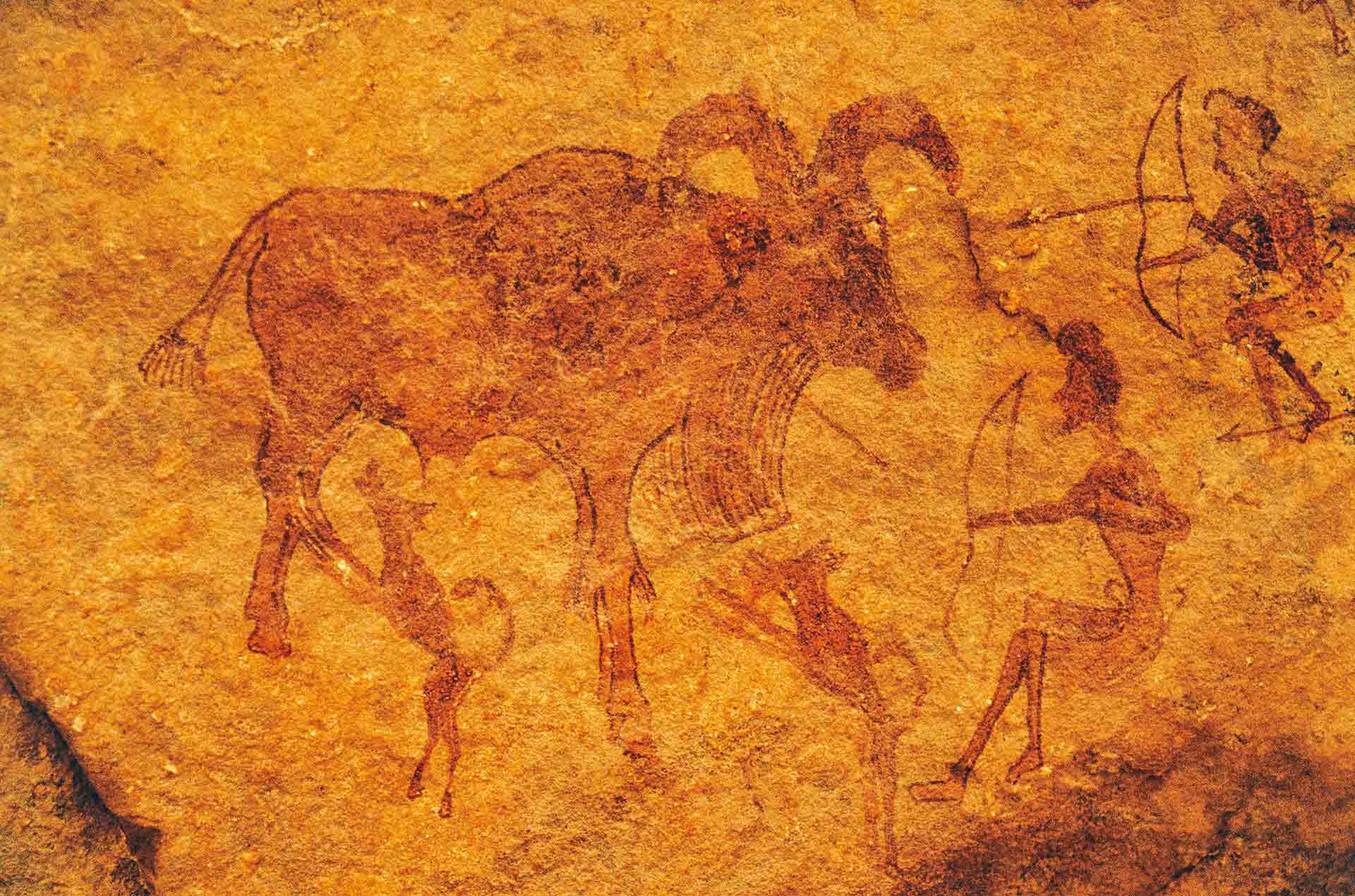 Esta escena de caza en Tassili (Argelia) muestra la colaboración entre perros y hombres. Se cree que esta alianza determinó el fin de los neandertales.