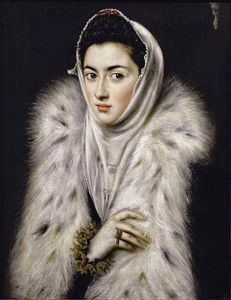 «La dama del armiño (o, mejor, del lince) es una pintura sorprendente para tratarse de una obra del siglo XVI por el contacto visual directo de la mujer con el espectador. Pese a algunas tentativas, no se ha demostrado que la retratada sea Jerónima de las Cuevas, la mujer de origen humilde madre del hijo del Greco. Es uno de sus escasos retratos femeninos».